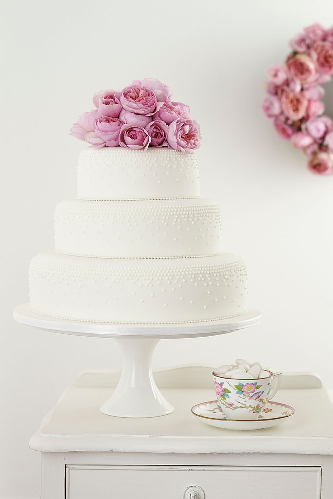 Sugar-paste roses on a finished celebration cake